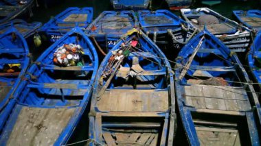 Close up moovement of fishing boats moored in Essaouira port