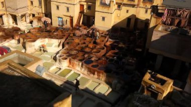 FEZ / MOROCCO - JANUARY 20, 2020: Moroccan men work in famous Chouara Tannery