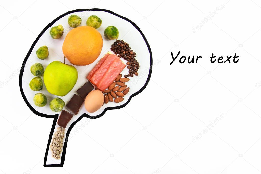 Food good for the brain and mental activity. Fruits, almonds, nuts, seeds, fatty fish, dark chocolate, coffee, herbs, sprouts. Food for thinking and mind on white background with place for text.