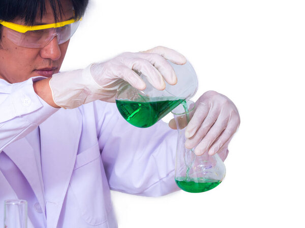 close up, Asian scientist  hand pouring green liquid solution to research for virus or develop chemical or medicine in laboratory.  Science and health concept on white background.