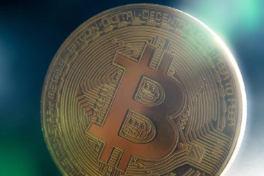 Altın bitcoin sikke sanal ekonomi ya da kripto para birimi unsurları sembolize ediyor.
