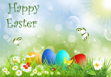 Paskalya yumurtaları çim ve kelebekler. 