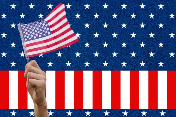 Hand holding flag against American flag — Stock Photo, Image