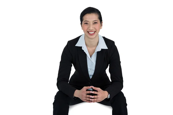 Confidence businesswoman sitting — Stockfoto