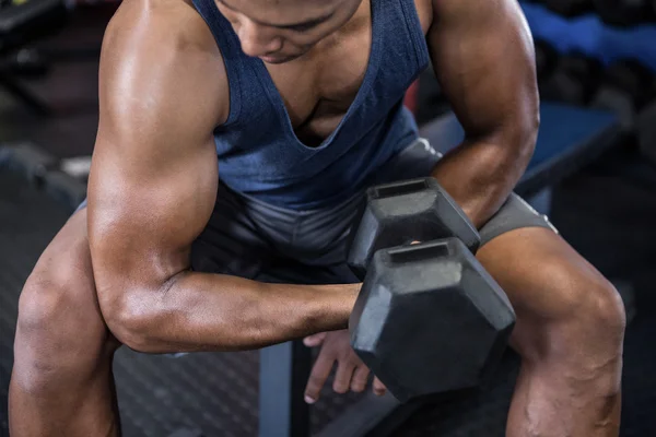 Man exercising with dumbbell — Stock Photo, Image