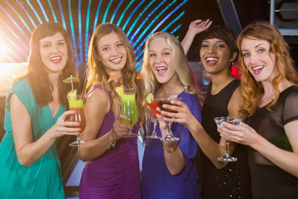 Friends having glass of cocktail at bar counter — Stock Photo, Image