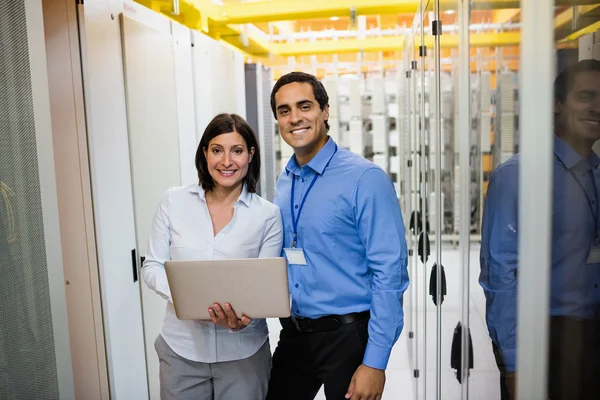 Technicians using laptop — Stock Photo, Image