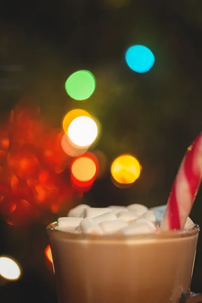 Cup of coffee with marshmallow and candy cane — Stock Photo, Image