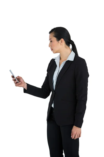 Businesswoman using mobile phone — Stock Photo, Image