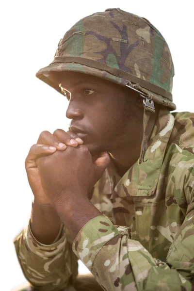 Soldado reflexivo sobre fondo blanco — Foto de Stock