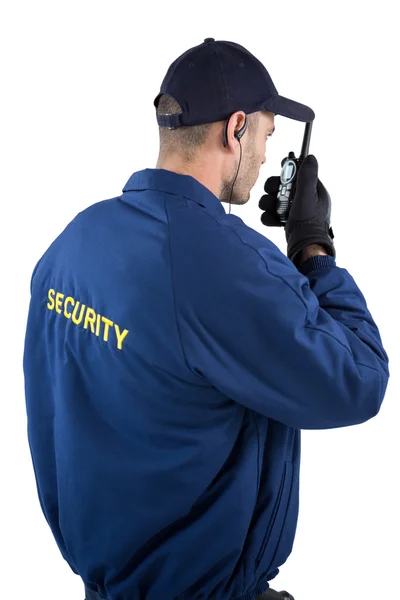 Oficial de seguridad hablando en walkie-talkie — Foto de Stock