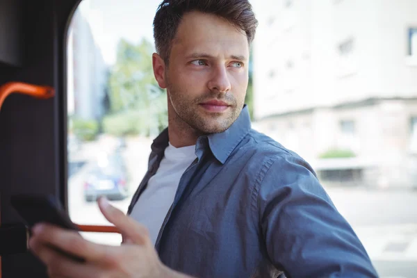 Handsome man travelling in bus — Stock Photo, Image