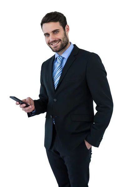 Mensajería de texto de hombre de negocios en el teléfono móvil —  Fotos de Stock