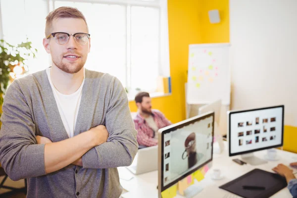 Confident editor with arms crossed — Stock Photo, Image