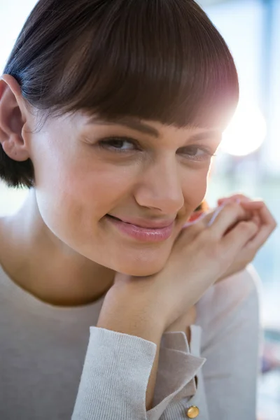 Smiling woman in cafeteria — Stock Photo, Image