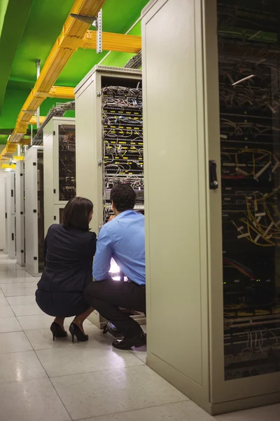 Technicians analyzing server — Stock fotografie