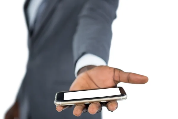 Businessman holding mobile phone — Stock Photo, Image