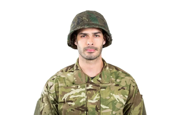 Soldato in piedi su sfondo bianco — Foto Stock