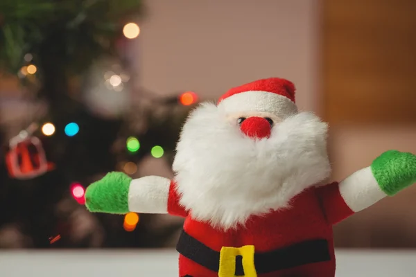 Santa claus na drewnianym stole — Zdjęcie stockowe