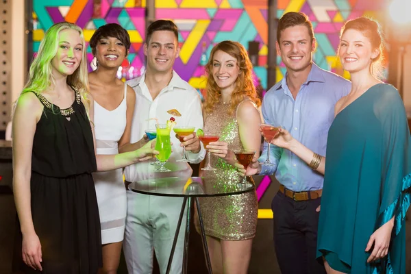 Friends having glass of cocktail in bar — Stock Photo, Image