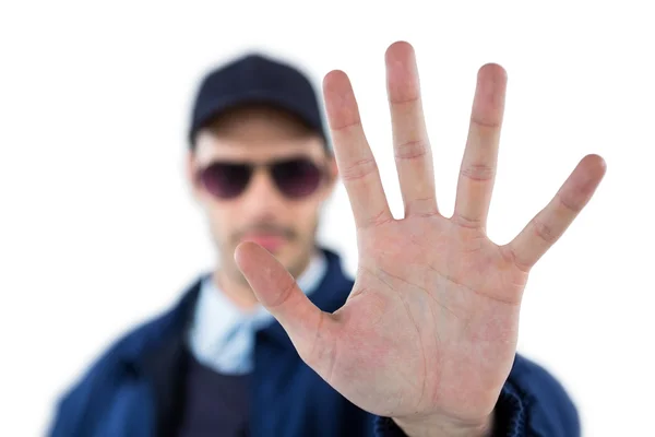 Confident security officer making stop gesture — Stock Photo, Image