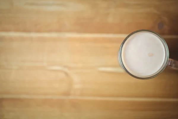 Taza de café sobre mesa de madera —  Fotos de Stock