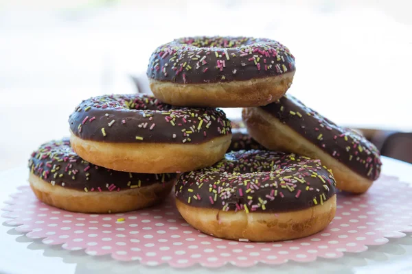 Close-up of doughnuts in cafeteria — Stock Photo, Image