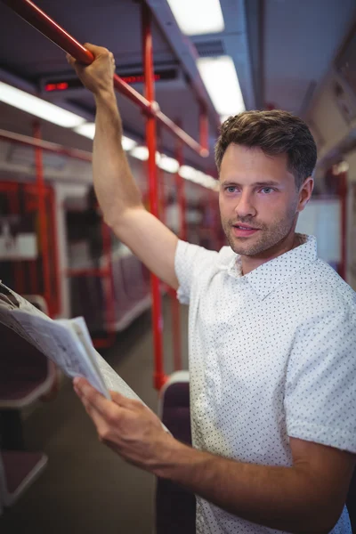 Handsome man listening music on phone — Stock Photo, Image