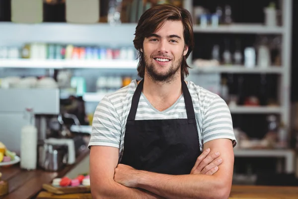 Waiter standing with arm crossed — Stock Photo, Image