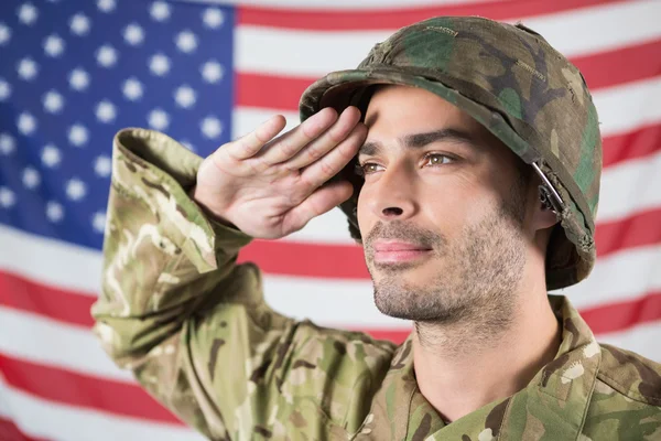 Confident soldier saluting — Stock Photo, Image