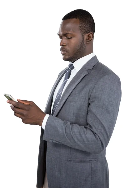 Affärsman som använder sin mobiltelefon — Stockfoto