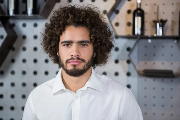 Bartender standing in bar counter — Stock Photo, Image