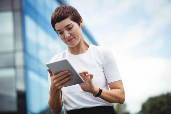 Businesswoman using digital tablet — Stock Photo, Image