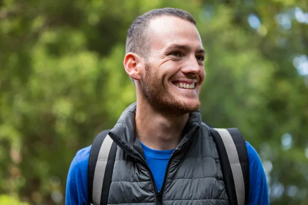 Male hiker hiking in forest — Stock Photo, Image