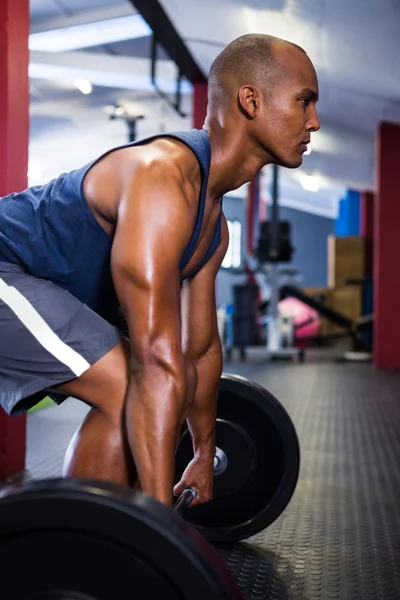 Mannelijke atleet hijs barbell — Stockfoto