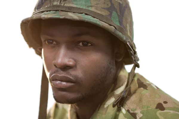 Thoughtful soldier against white background — Stock Photo, Image