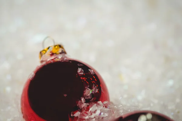 Christmas baubles on snow — Stock Photo, Image