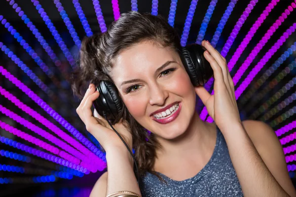 Pretty female DJ playing music — Stock Photo, Image