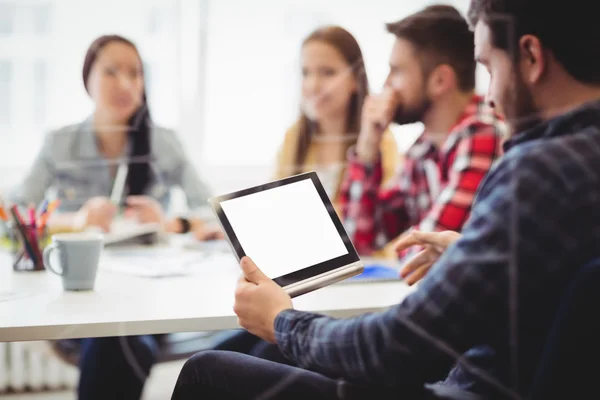 Colleague using digital tablet — Stock Photo, Image