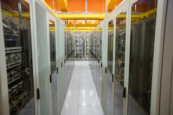 Hallway with a row of servers — Stock Photo, Image