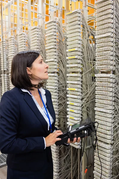 Technician using digital cable analyzer — Stock Photo, Image