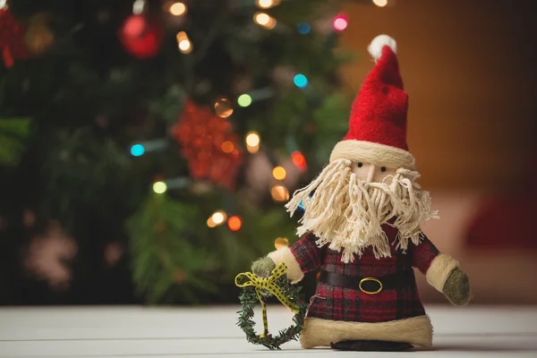 Санта Клаус на дерев'яному столі — стокове фото