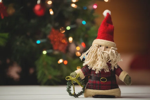 Papai Noel na mesa de madeira — Fotografia de Stock