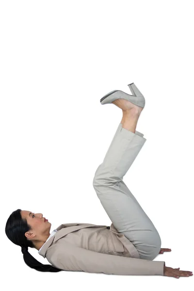 Businesswoman performing exercise — Stock Photo, Image