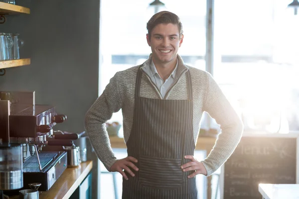 Waiter standing with hand on hip — Stock Photo, Image