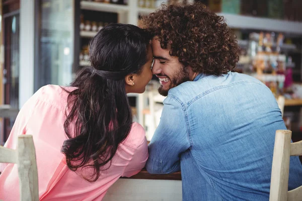 Couple romancing in cafeteria — Stock Photo, Image