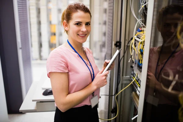 Technician using digital tablet — Stock Photo, Image