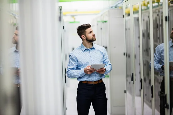 Technician using digital tablet — Stock Photo, Image