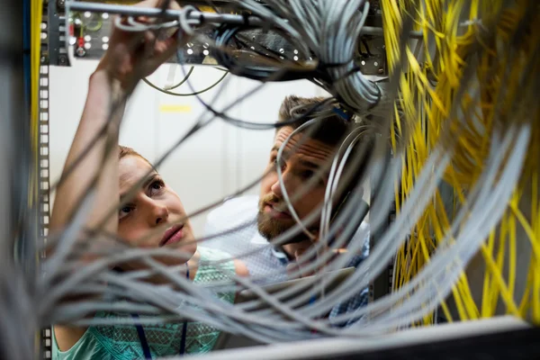 Technicians fixing cable — Stock Photo, Image