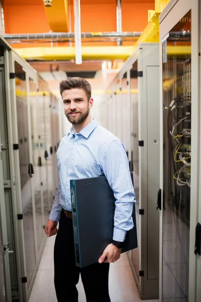 Technician holding server — ストック写真